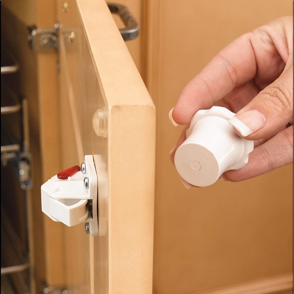 Child magnetic cabinet locks. Rev-a-shelf